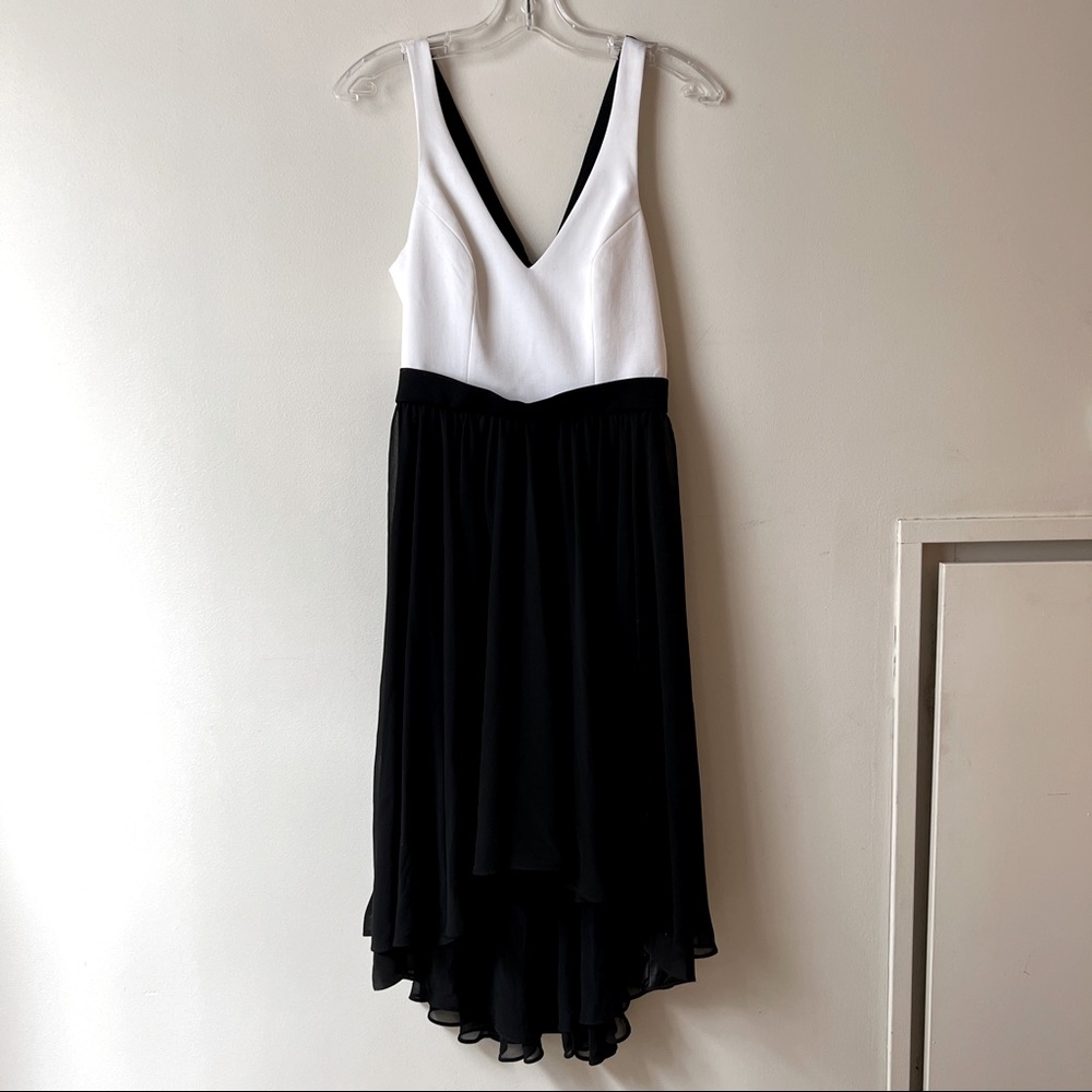 Black Halo fit and flare dress with flowy skirt asymmetrical hemline